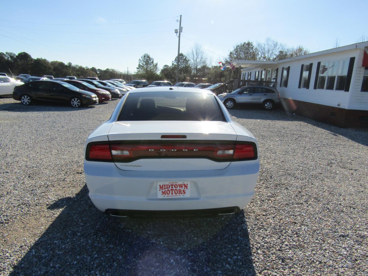 2014 White Dodge Charger SE (2C3CDXBG5EH) with an 3.6L V6 DOHC 24V engine, Automatic transmission, located at 15016 S Hwy 231, Midland City, AL, 36350, (334) 983-3001, 31.306210, -85.495277 - Photo#6